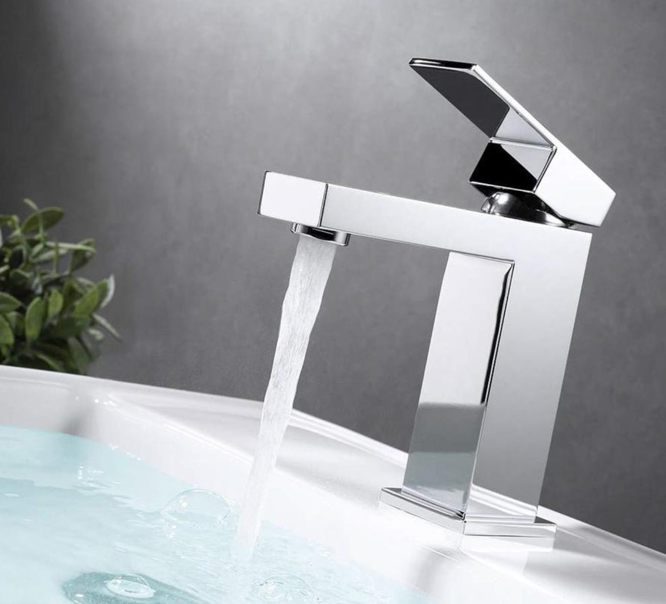Grifo de lavabo de repisa 003 en latón cromado de la colección Enipée