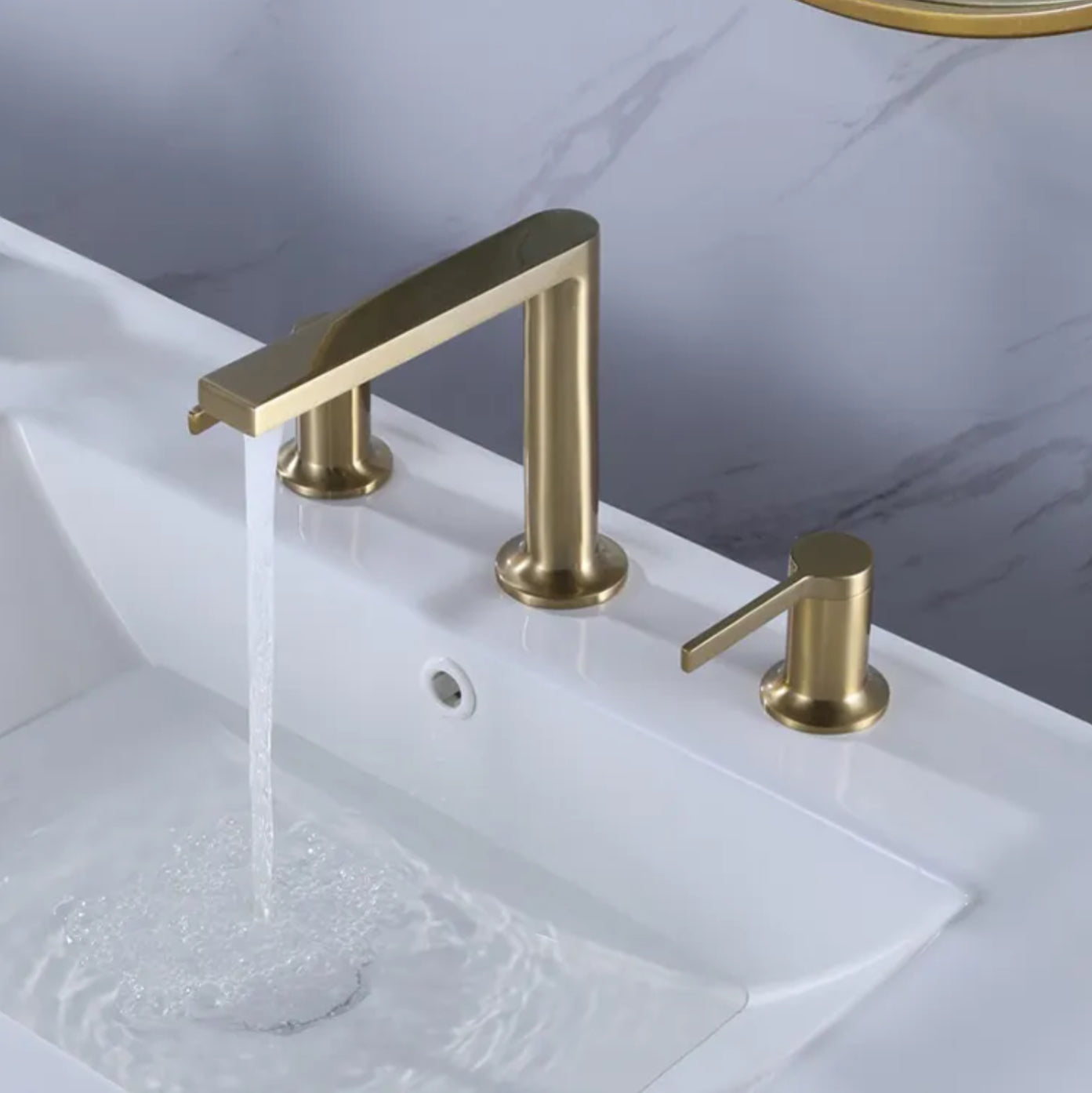 Grifo para lavabo de sobre encimera 026 dorado 3 agujeros
