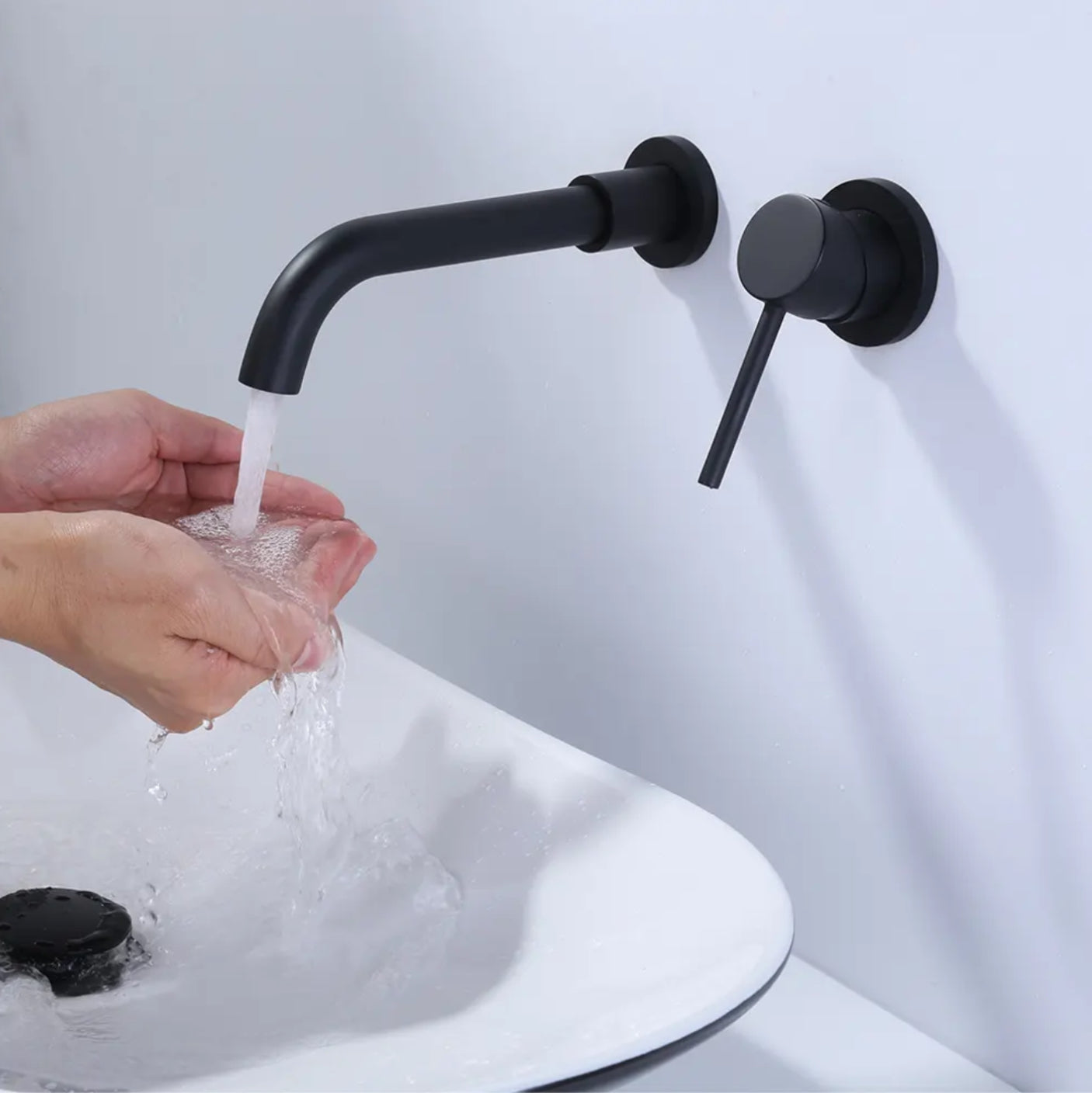 Grifo de lavabo de pared 022B negro colección Céphise