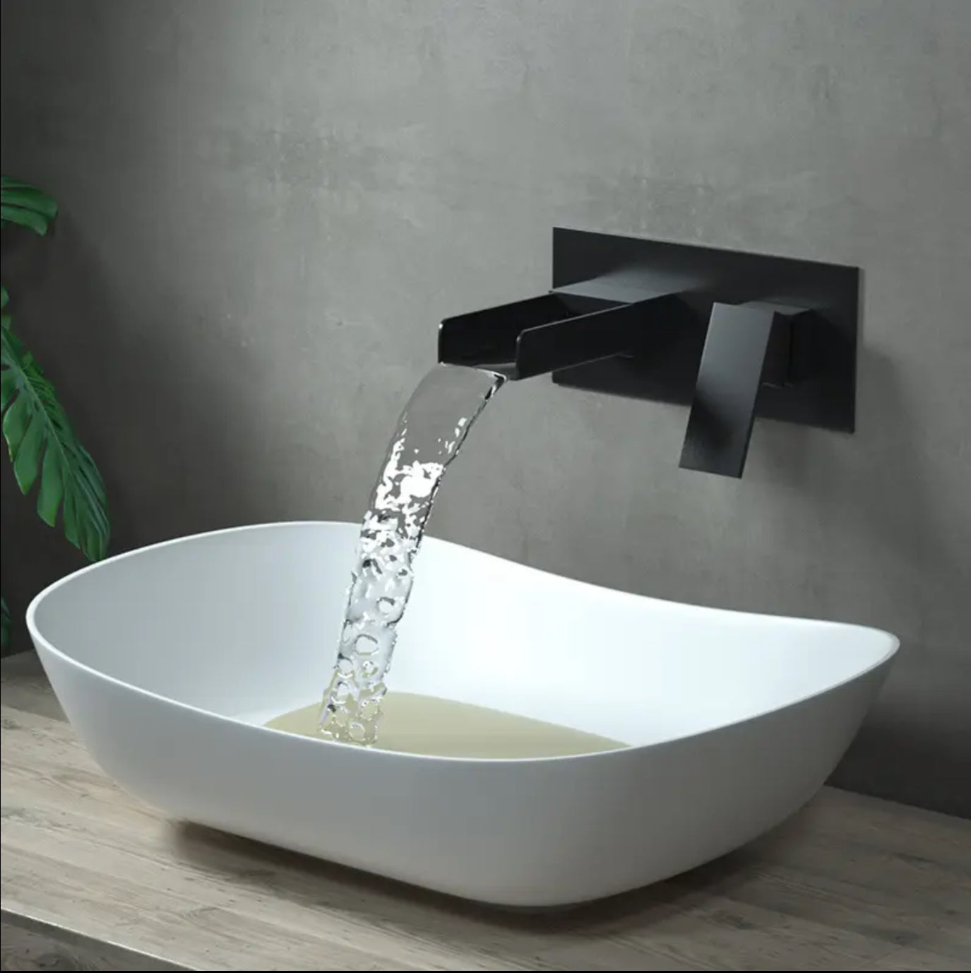 Grifo de lavabo de pared 007 en latón negro de la colección Alphée 