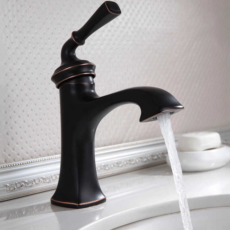 Grifo de lavabo de repisa 062 en latón negro de la colección Céphise
